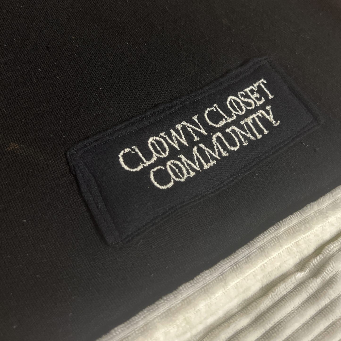 Hand held hooded scarf