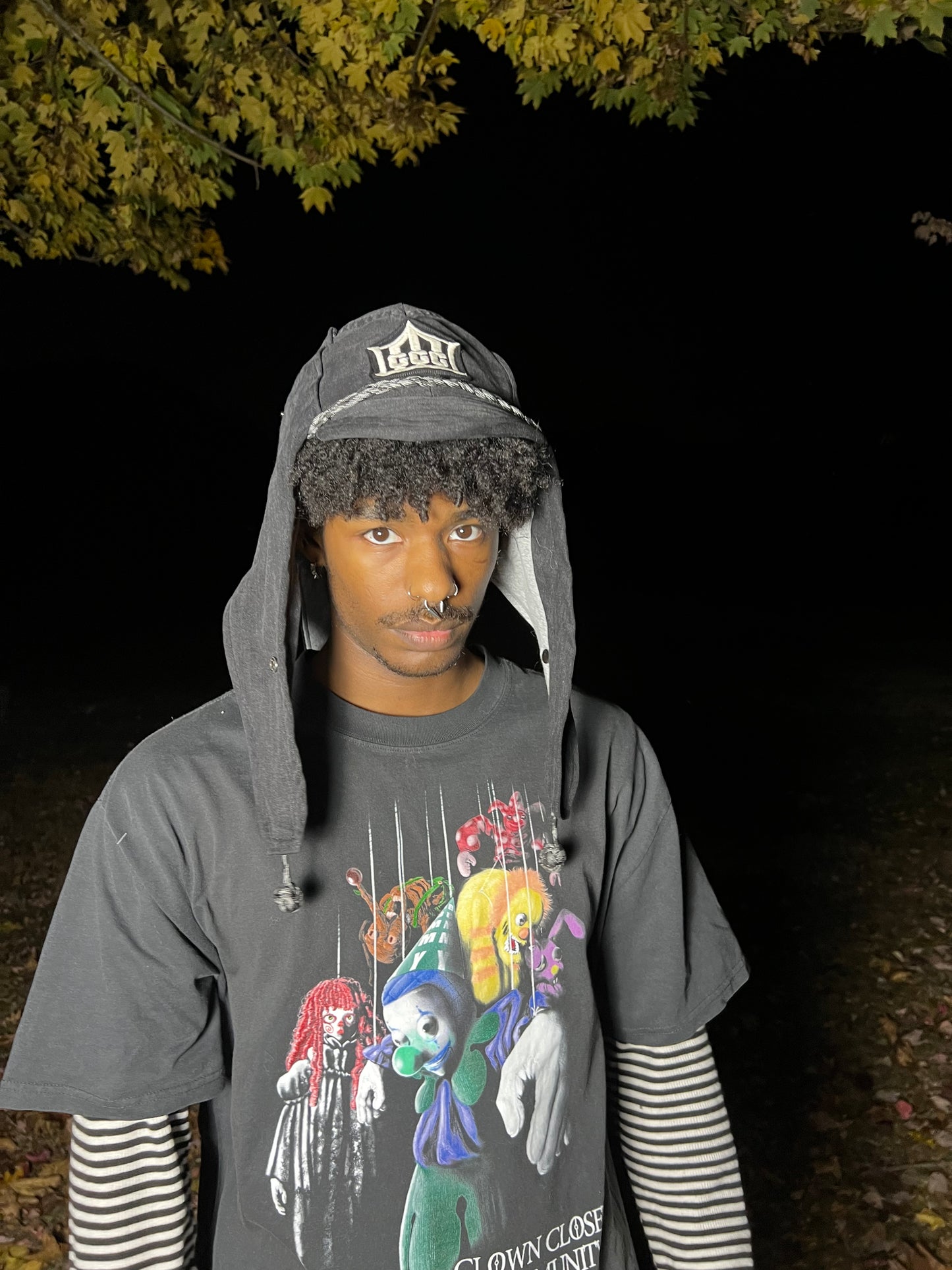 Faded black jester coffin cap